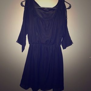 Black long sleeved dress gathered at waist